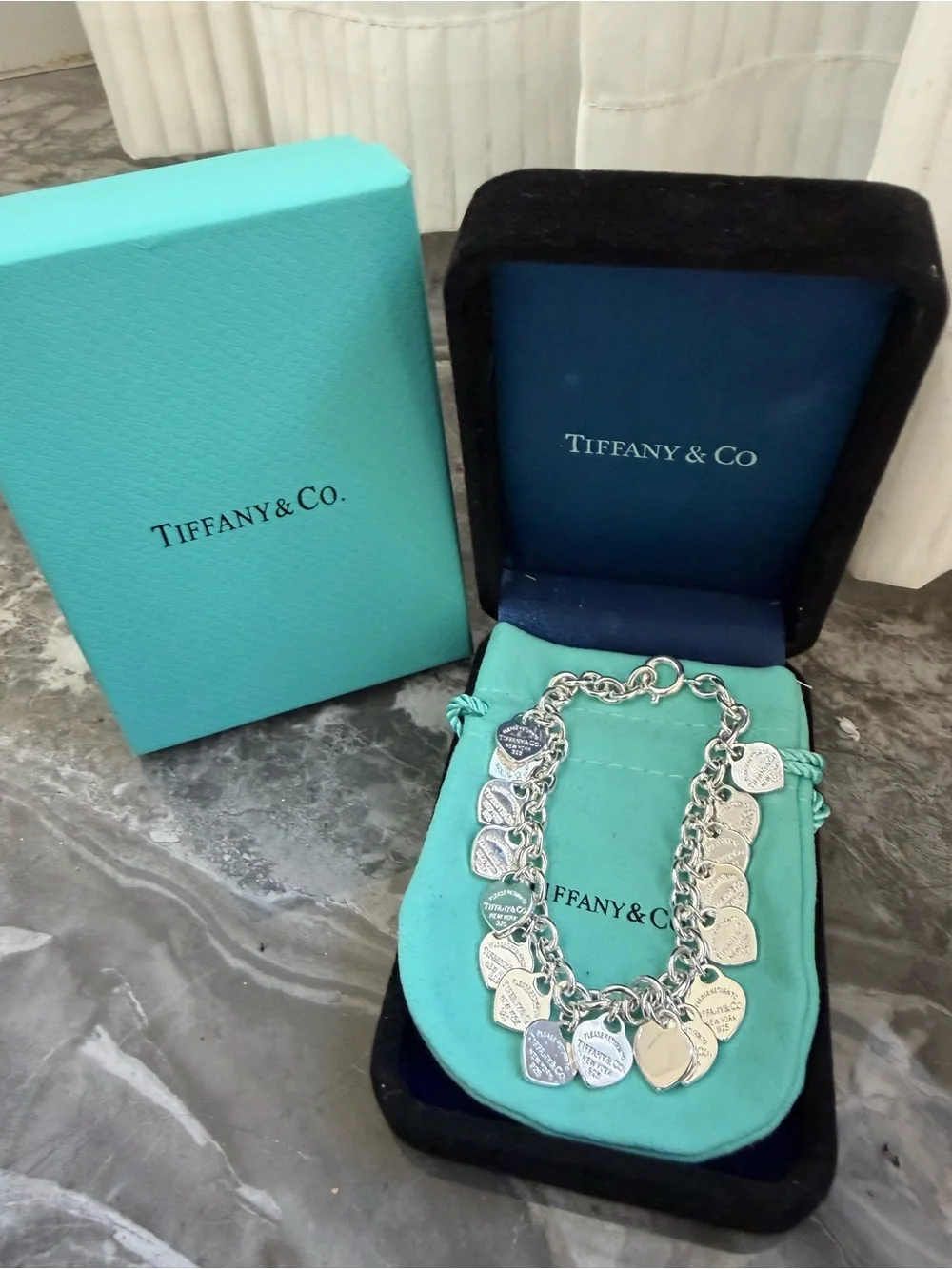 Tiffany & Co. Sterling Silver Multi-Heart Charm Bracelet with Signature Blue